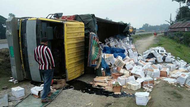 3 of a family killed as truck overturns