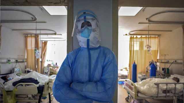 China reports 1,886 new virus cases, death toll up by 98