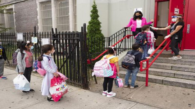 New York City public schools will begin to reopen with weekly Covid-19 testing