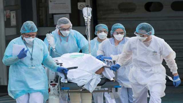 Global Covid-19 deaths surge past 9 lakh