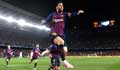 Messi double leads Barca to semis