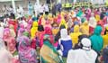2,000  workers protest inside factory by halting production