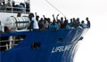 Italy to seize NGO ships amid migrant row