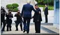 Trump becomes first sitting president to step foot into N Korea