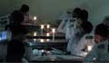 Rangpur HSC examinees take exams under candlelight