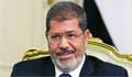 Egypt former President Morsi buried after courtroom death