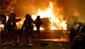 France unrest: Riots spread, thousands march in memory of shot teenager