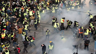 France's 'yellow vests' clash with police in Paris