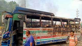 Two buses set on fire as their competition leaves motorcyclist killed