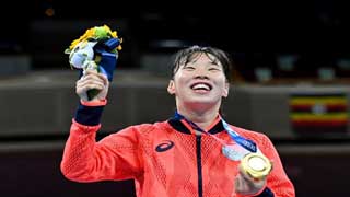Irie becomes Japan's first woman champion in Olympic boxing