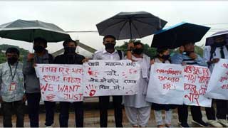 Braving rain, students protest for safe roads