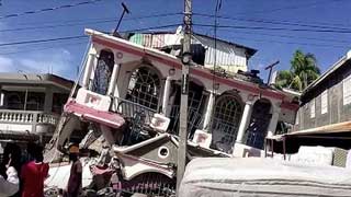 Haiti quake survivors cry for help as death toll nears 2,000