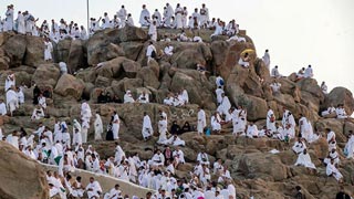 Pilgrims scale Mount Arafat for climax of biggest Covid-era Hajj