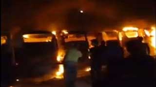 12 buses torched in Faridpur