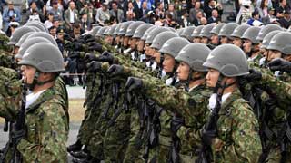 Pacifist Japan unveils biggest military build-up since World War II