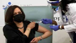 Kamala Harris vaccinated on camera, urges public to trust process