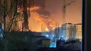 Russian missiles hit town near Ukraine's Kyiv, oil depot on fire