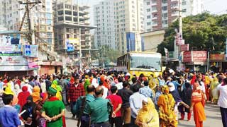 RMG workers block Adabor Ring Road