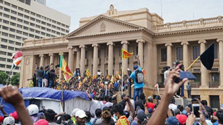 Sri Lanka president flees as protesters storm home