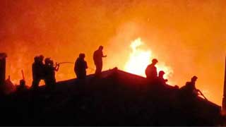 Dhaka slum catches fire