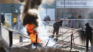 Dozens arrested at Sweden riots sparked by planned Quran burnings