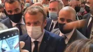 Macron hit with egg during restaurant fair visit