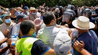 Tunisia President Kais Saied accused of coup amid clashes