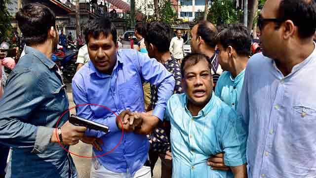 Plainclothes police wield weapons during BNP’s protest