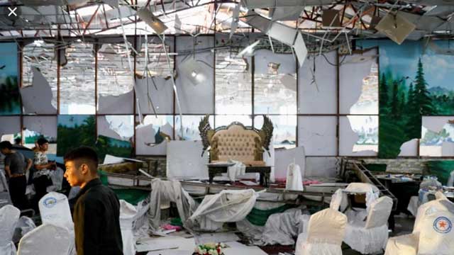 Afghan wedding suicide blast kills 63