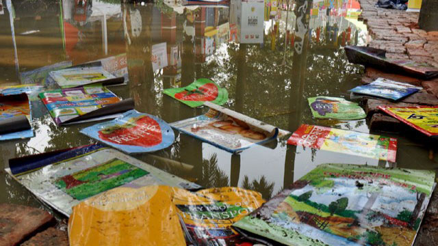 Rain damages stalls, thousands of books at Ekushey book fair