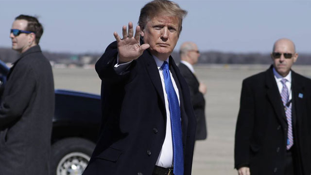 Trump tamps down expectations as he heads to Kim summit