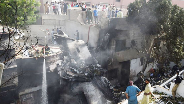 Pakistani plane with 98 on board crashes on homes in Karachi