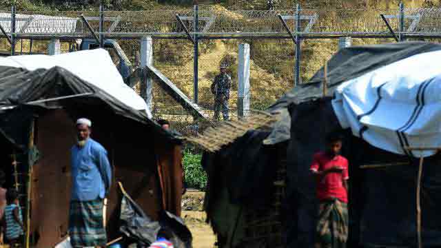 Myanmar army open fire along border to frighten Rohingyas