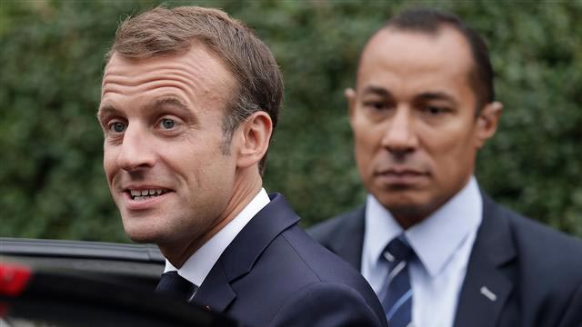 Macron in rare torture admission