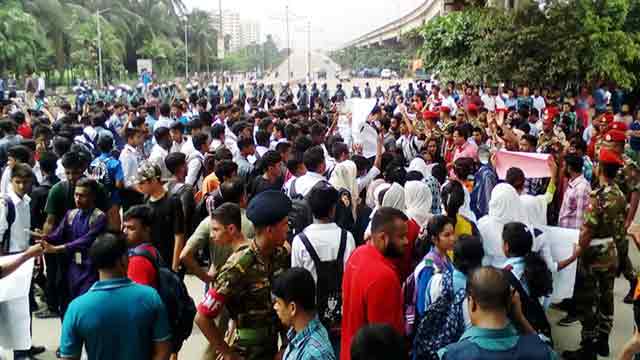 Angry students block Airport Road
