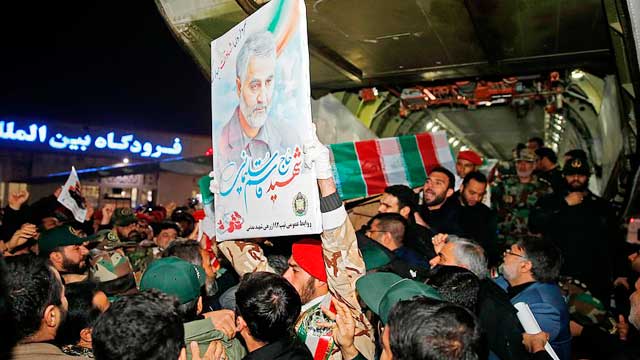 Mourners flood Iran cities as top general's remains return