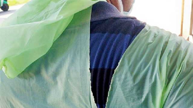 India doctors fight virus with raincoats, helmets
