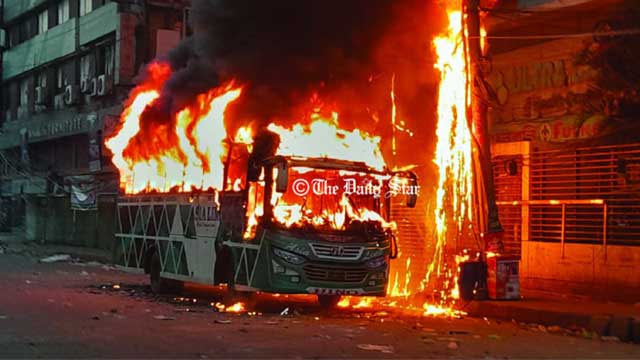 Policemen set bus on fire in Dhaka!