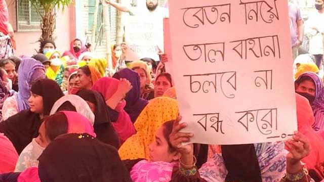RMG workers block Mohakhali-Banani road demanding dues