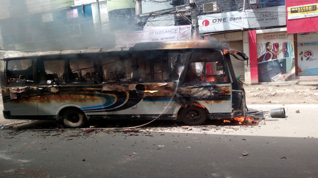 Bus torched after it kills motorcyclist in city