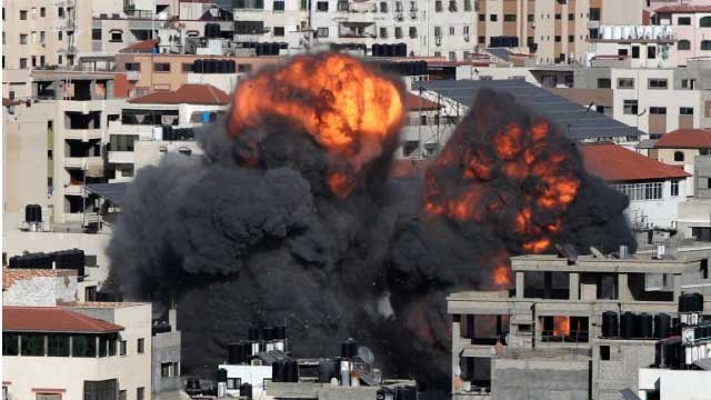 Israel pounds Gaza with air raids, shelling