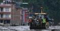 Hundreds feared trapped in hydropower tunnels as Nepal-Tibet flood death toll tops 950